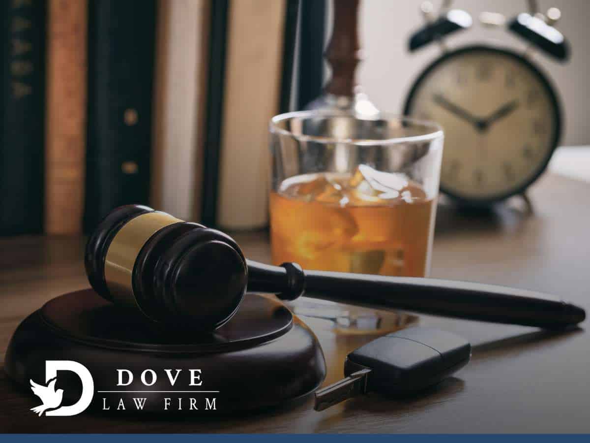 Gavel, car key, and drink symbolizing legal consequences of a DUI in Arizona